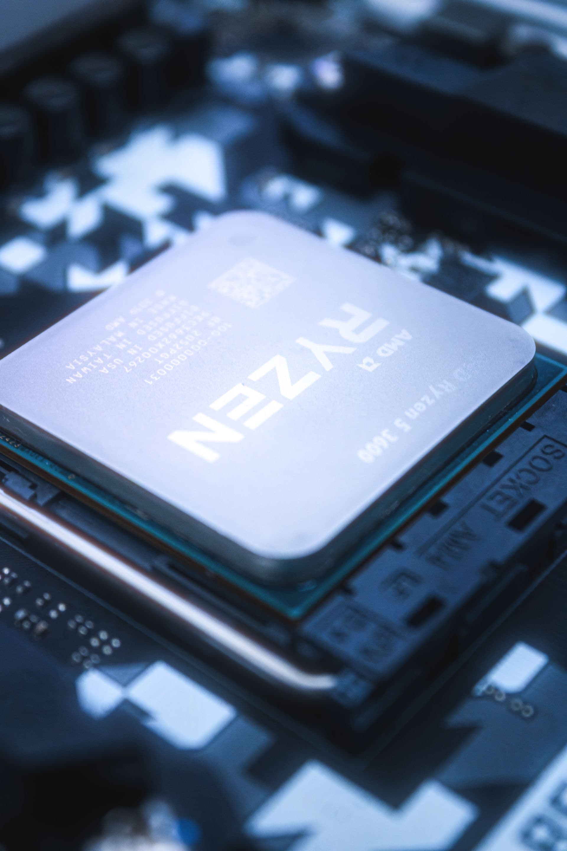 An AMD Ryzen processor seated in a motherboard socket